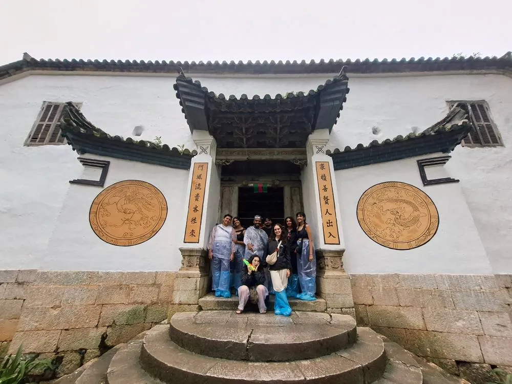 Our team with guests at the Hmong King palace