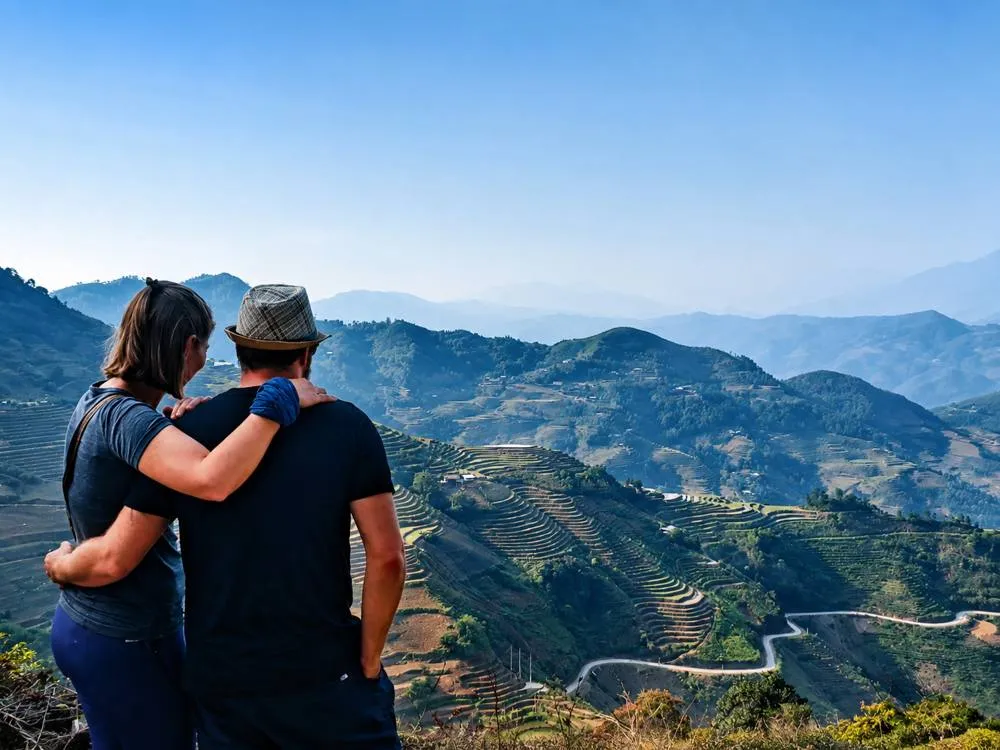 Couple looking over rice terraces