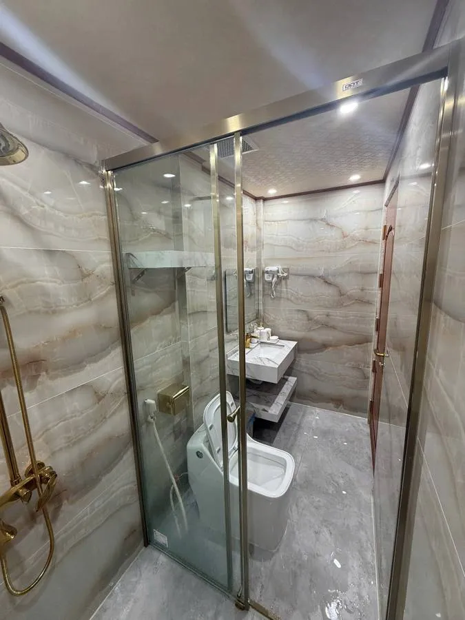 Marble bathroom with glass shower