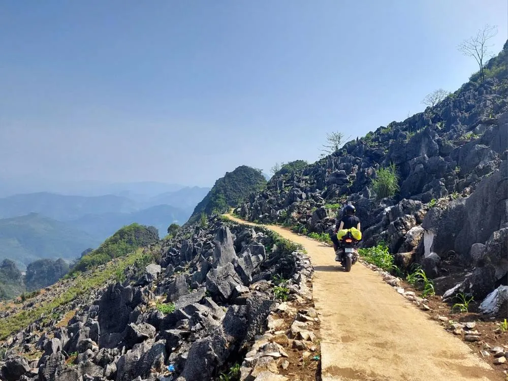 Rider on a rocky mountain road